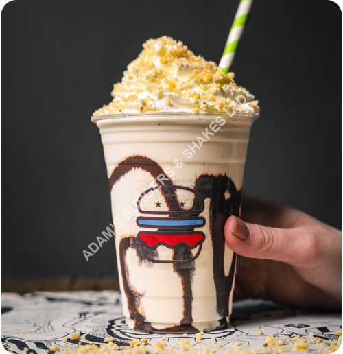 Banoffee Shake - Banana shake with toffee sauce, chocolate sauce, whipped cream & biscuit crumb.
