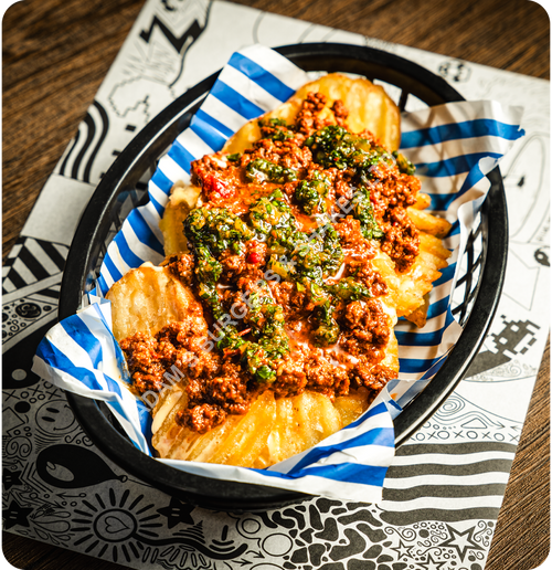 Chilli Cheese Fries  - Seasoned ridge cut potato slices, beef chilli & chimichurri.